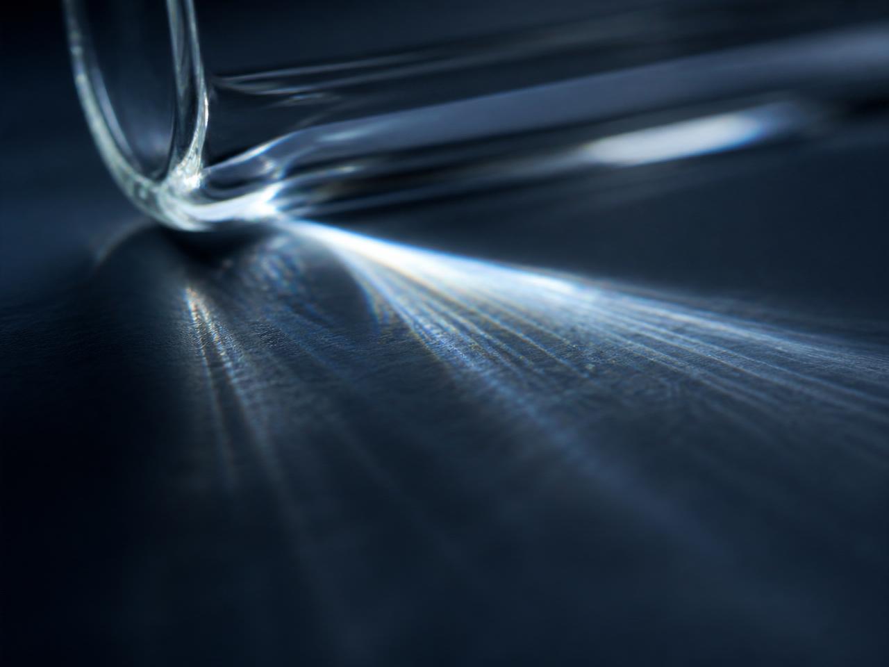Abstract macro study of light refracting through laboratory glass
